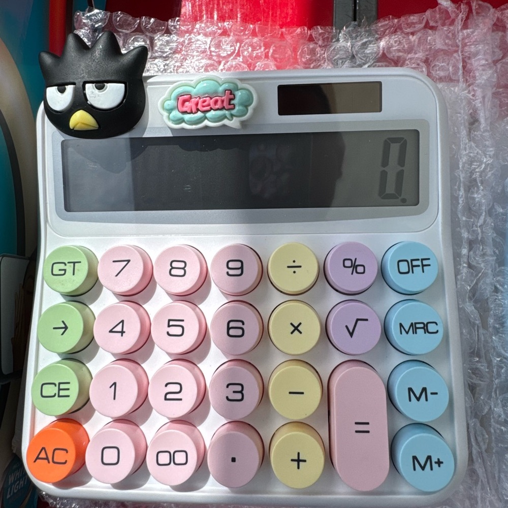 Cute BatzMaru Pastel desk Calculator - Pink, Blue, Yellow color buttons.